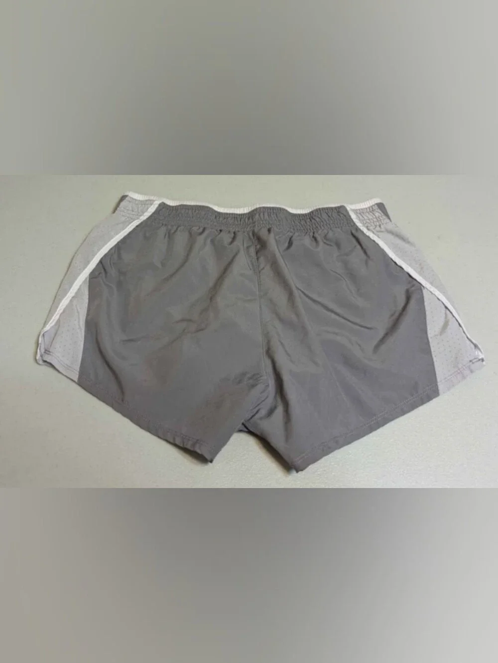 Women's small gray and white Nike shorts